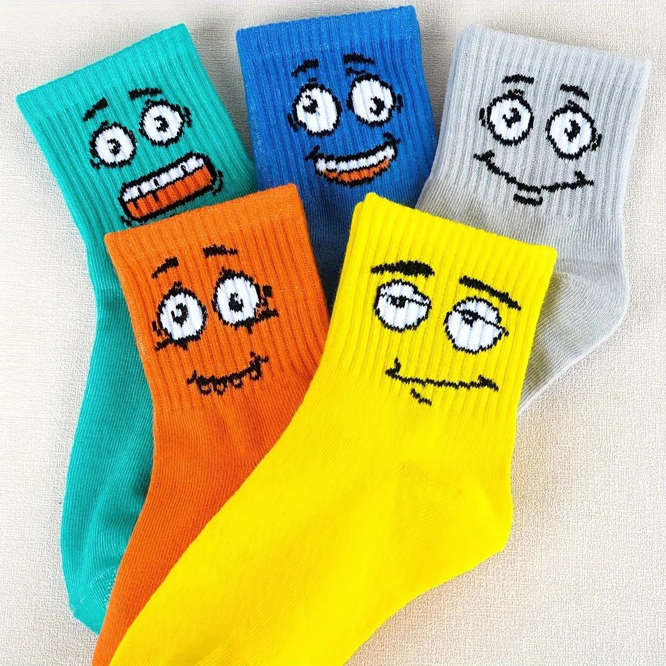 5 pairs of colorful children's socks with cute emoticons